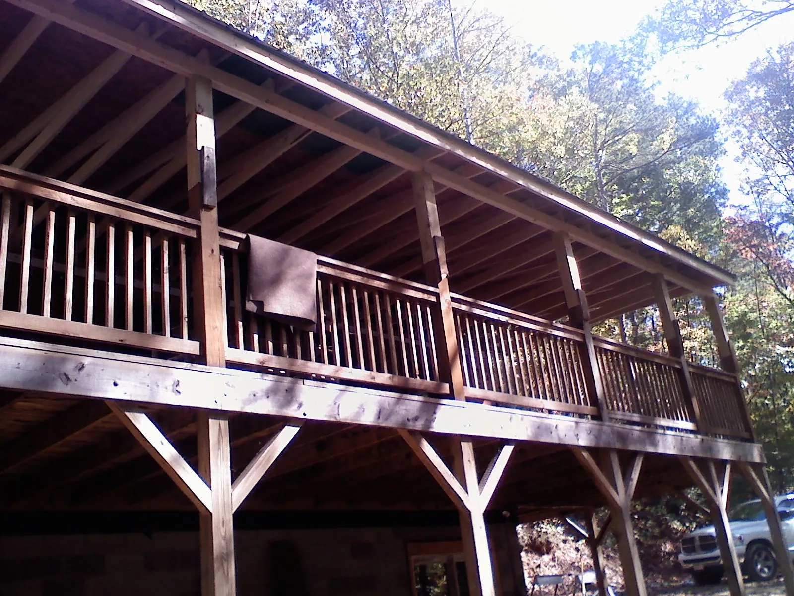 Timber framing under a new elevated porch and deck — Roof Leak Repair in Lewellen by Roofing Brothers